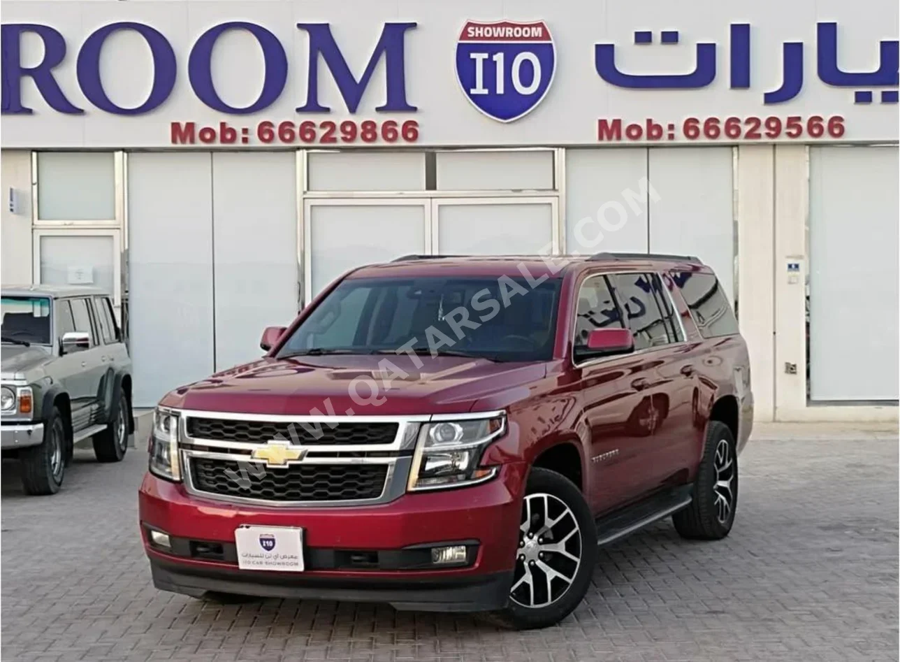 Chevrolet  Suburban  2015  Automatic  201,000 Km  8 Cylinder  Four Wheel Drive (4WD)  SUV  Maroon