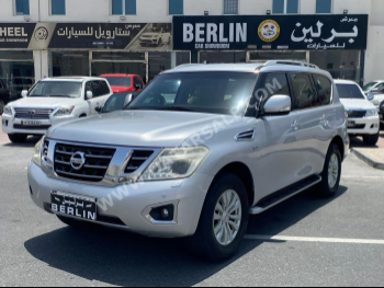 Nissan  Patrol  SE  2015  Automatic  219,000 Km  8 Cylinder  Four Wheel Drive (4WD)  SUV  Silver