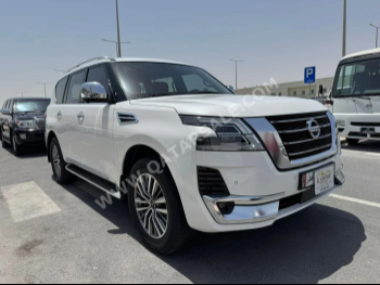 Nissan  Patrol  Platinum  2021  Automatic  119,000 Km  8 Cylinder  Four Wheel Drive (4WD)  SUV  White