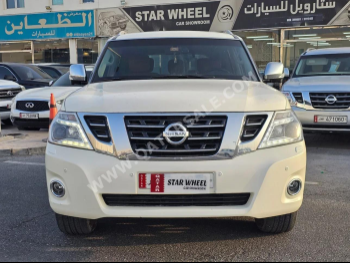 Nissan  Patrol  Platinum  2014  Automatic  264,000 Km  8 Cylinder  Four Wheel Drive (4WD)  SUV  White
