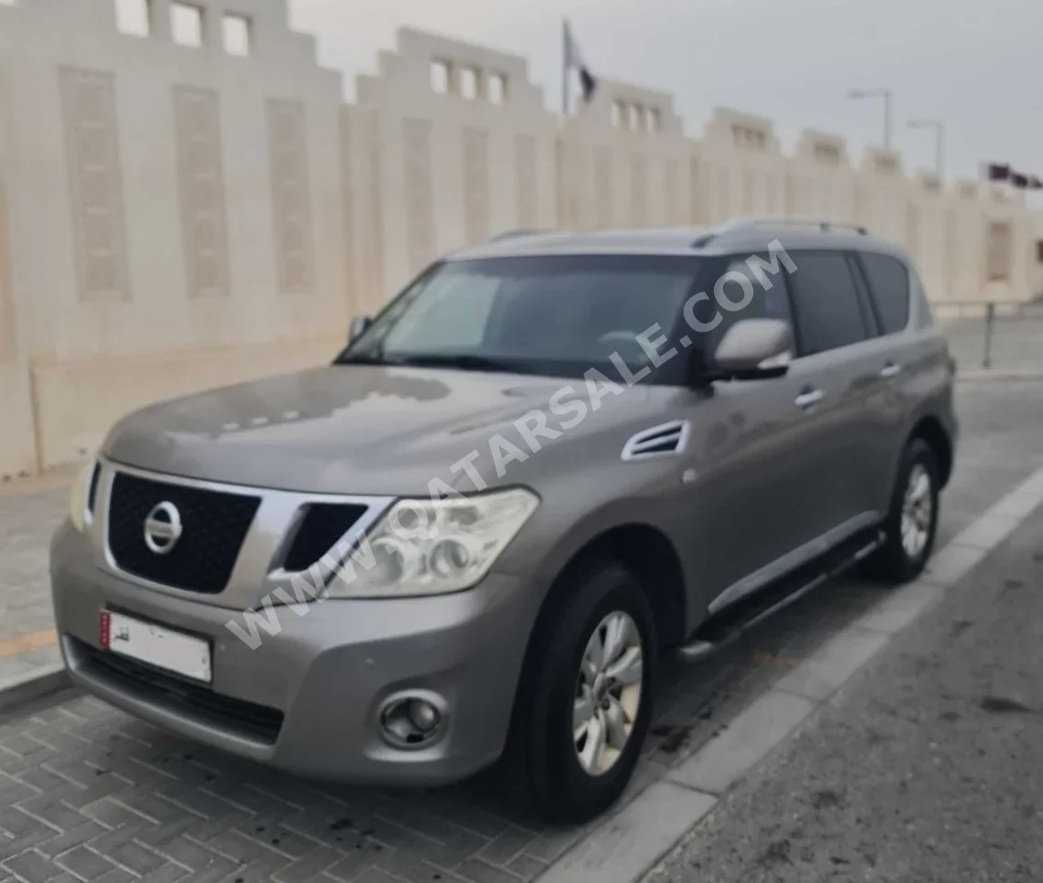 Nissan  Patrol  SE  2012  Automatic  309,000 Km  8 Cylinder  Four Wheel Drive (4WD)  SUV  Gray