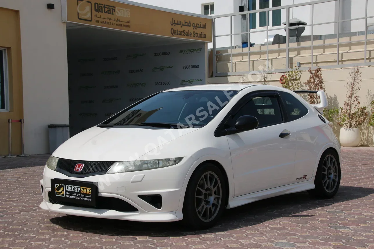 Honda  Civic  R Type  2010  Manual  79,000 Km  4 Cylinder  Front Wheel Drive (FWD)  Coupe / Sport  White