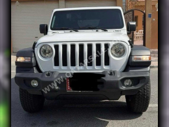 Jeep  Wrangler  Sport  2023  Automatic  21,000 Km  6 Cylinder  Four Wheel Drive (4WD)  SUV  White  With Warranty