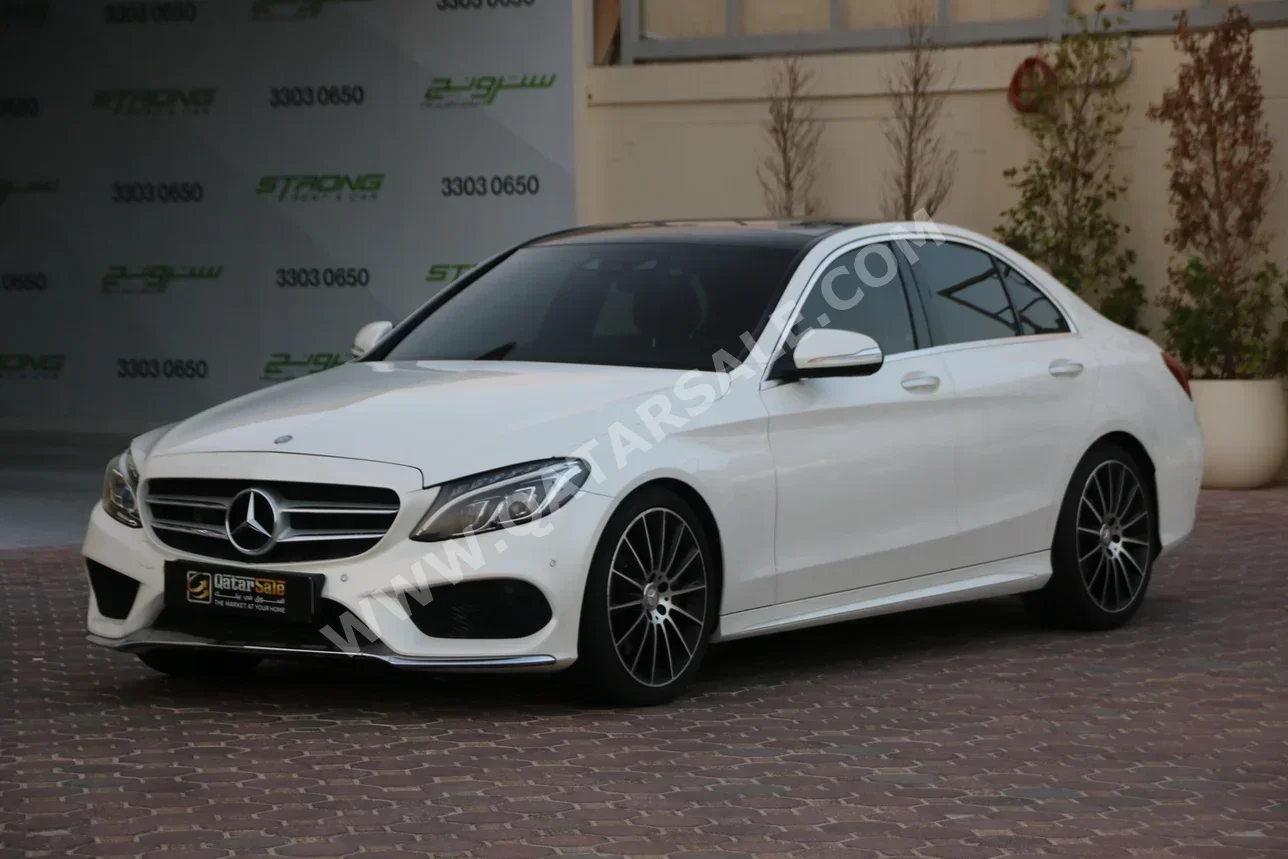 Mercedes-Benz  C-Class  250  2015  Automatic  106,000 Km  4 Cylinder  Rear Wheel Drive (RWD)  Sedan  White