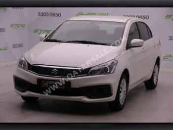 Suzuki  Ciaz  2024  Automatic  9,950 Km  4 Cylinder  Front Wheel Drive (FWD)  Sedan  White  With Warranty