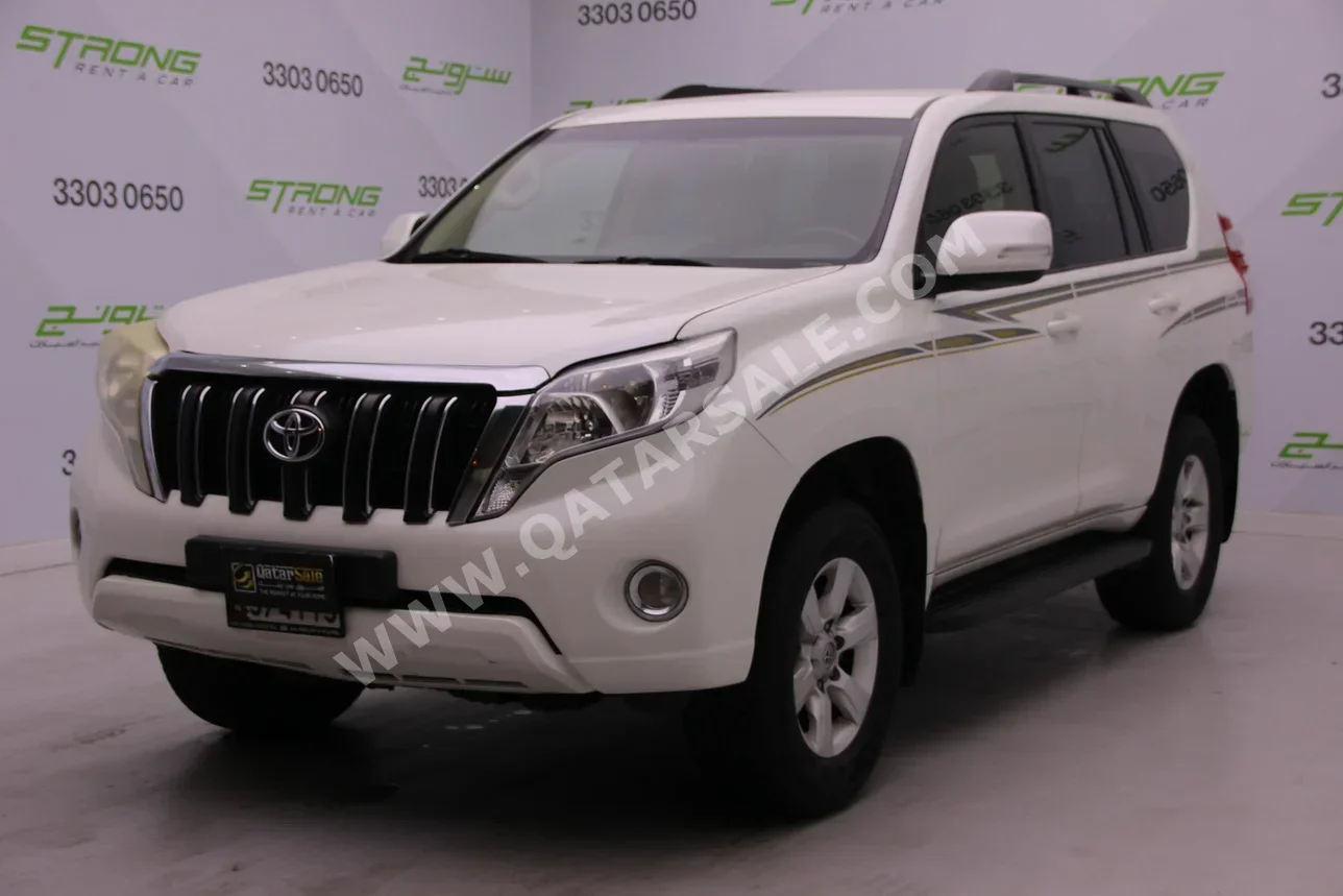 Toyota  Prado  TXL  2014  Automatic  253,000 Km  6 Cylinder  Four Wheel Drive (4WD)  SUV  White