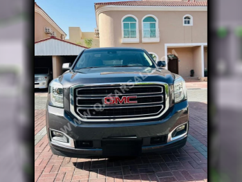 GMC  Yukon  SLE  2018  Automatic  124,000 Km  8 Cylinder  All Wheel Drive (AWD)  SUV  Gray