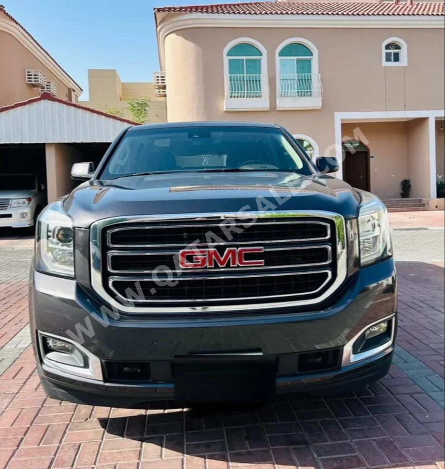 GMC  Yukon  SLE  2018  Automatic  124,000 Km  8 Cylinder  All Wheel Drive (AWD)  SUV  Gray