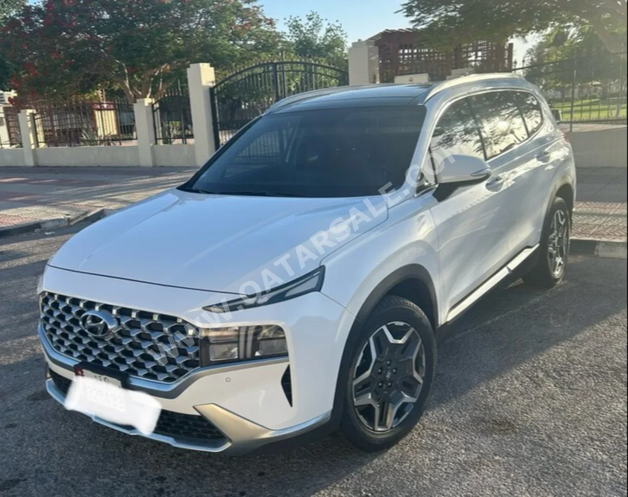 Hyundai  Santa Fe  Calligraphy  2023  Automatic  32,000 Km  6 Cylinder  All Wheel Drive (AWD)  SUV  White