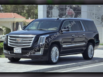 Cadillac  Escalade  Platinum  2015  Automatic  103,000 Km  8 Cylinder  Four Wheel Drive (4WD)  SUV  Black