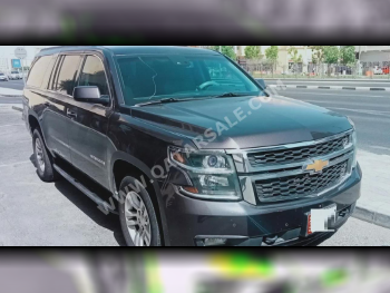  Chevrolet  Suburban  2016  Automatic  317,000 Km  8 Cylinder  Four Wheel Drive (4WD)  SUV  Gray  With Warranty