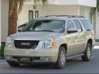 GMC  Yukon  XL  2010  Automatic  234,000 Km  8 Cylinder  Four Wheel Drive (4WD)  SUV  Gold