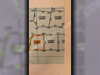 اراضي للبيع في الوكرة  - الوكير  -المساحة 990 متر مربع