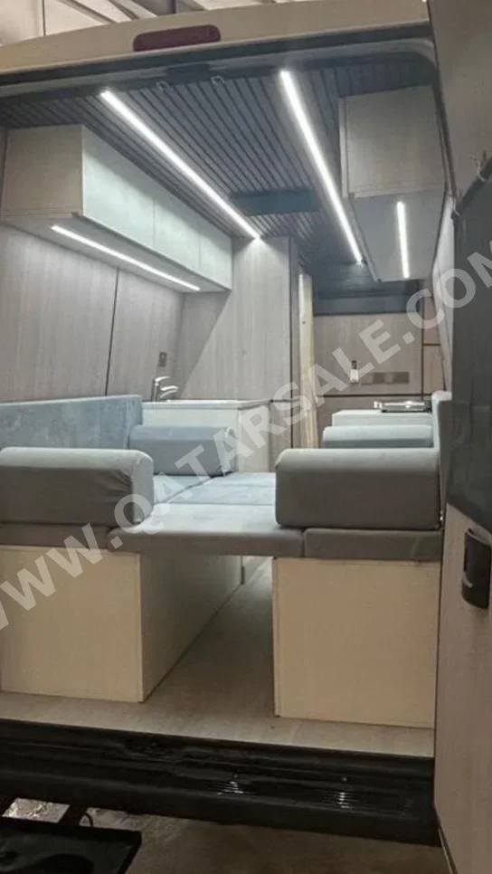 Caravan - 2022  - White  -Made in Qatar  - 48,000 Km