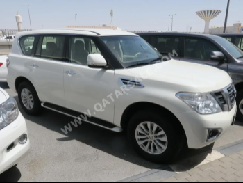 Nissan  Patrol  SE  2014  Automatic  225,000 Km  8 Cylinder  Four Wheel Drive (4WD)  SUV  White