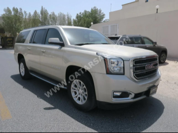 GMC  Yukon  XL  2016  Automatic  115,000 Km  8 Cylinder  Four Wheel Drive (4WD)  SUV  Gold