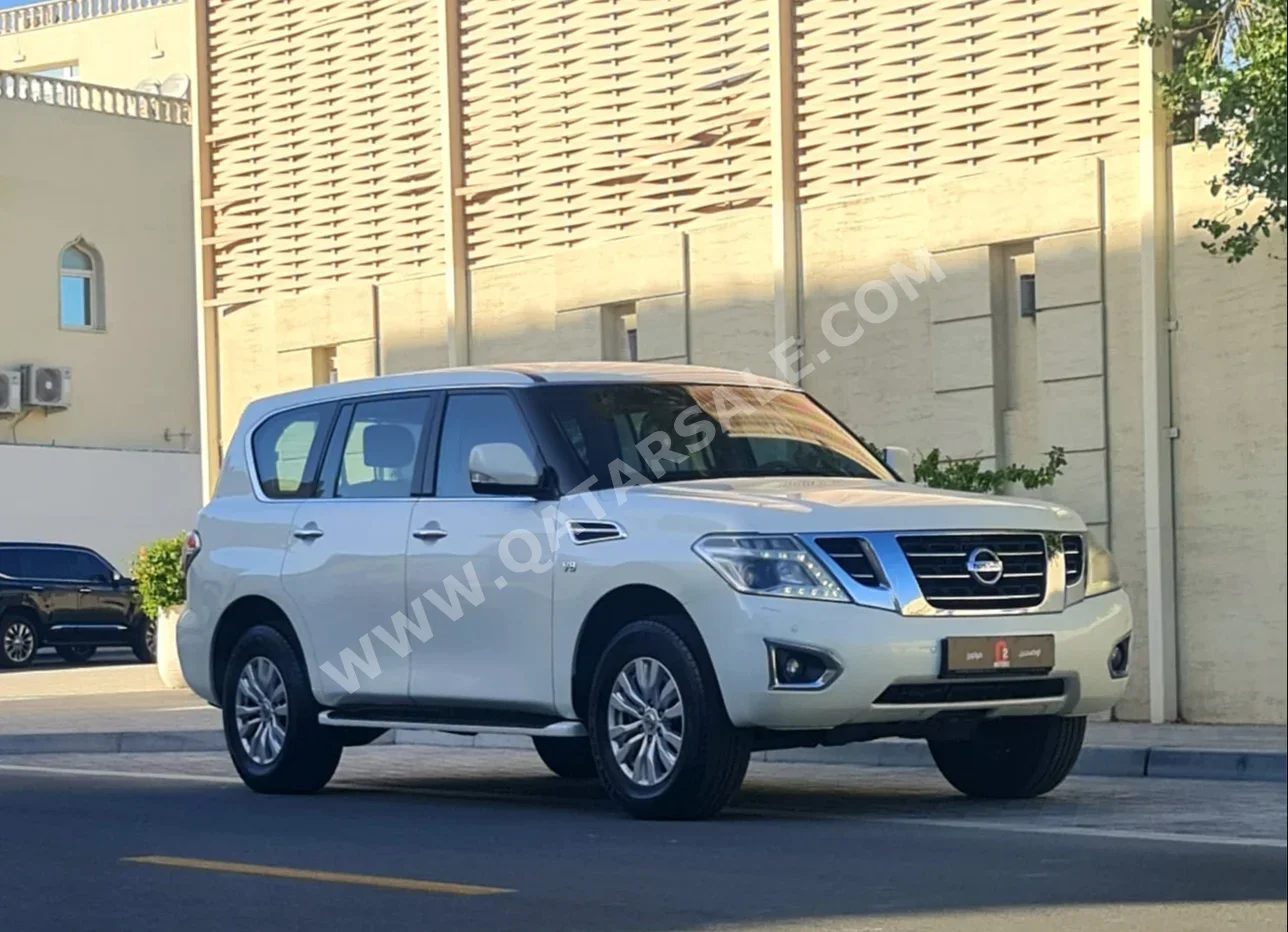 Nissan  Patrol  SE  2016  Automatic  183,000 Km  8 Cylinder  Four Wheel Drive (4WD)  SUV  White
