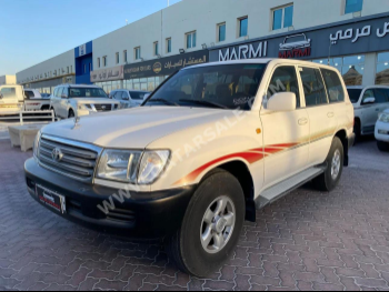 Toyota  Land Cruiser  GX  2003  Automatic  247,000 Km  6 Cylinder  Four Wheel Drive (4WD)  SUV  White