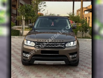 Land Rover  Range Rover  Sport HSE  2014  Automatic  143,000 Km  6 Cylinder  Four Wheel Drive (4WD)  SUV  Brown