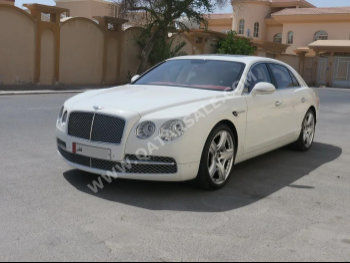 Bentley  Continental  Flying Spur  2015  Automatic  54,000 Km  12 Cylinder  All Wheel Drive (AWD)  Sedan  White