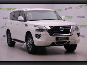 Nissan  Patrol  SE  2021  Automatic  135,000 Km  6 Cylinder  Four Wheel Drive (4WD)  SUV  White