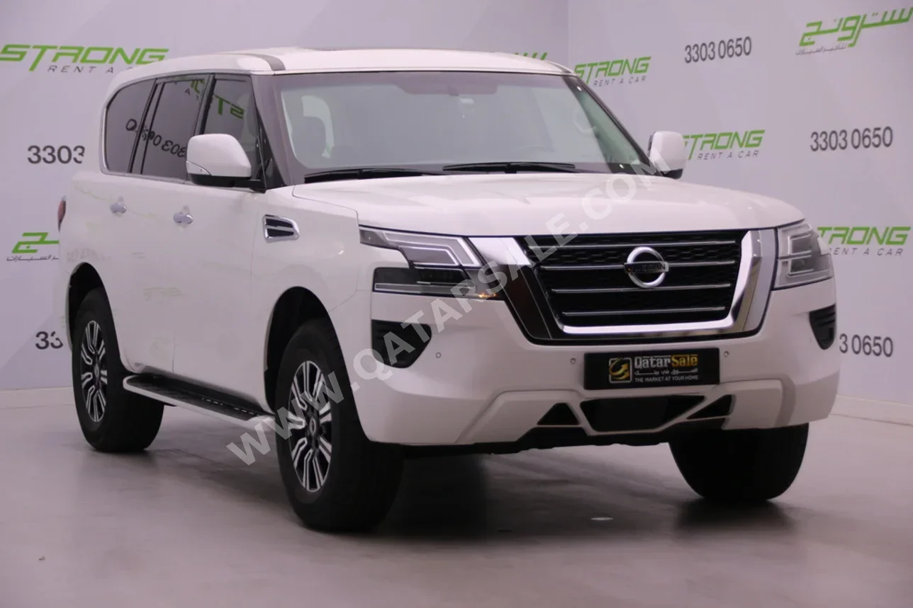 Nissan  Patrol  SE  2021  Automatic  135,000 Km  6 Cylinder  Four Wheel Drive (4WD)  SUV  White