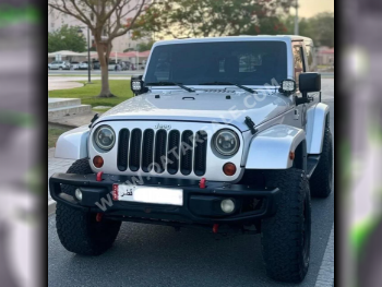 Jeep  Wrangler  Sport  2012  Automatic  178,000 Km  6 Cylinder  Four Wheel Drive (4WD)  SUV  Silver