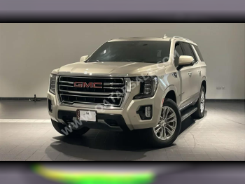GMC  Yukon  SLT  2023  Automatic  87,000 Km  8 Cylinder  Four Wheel Drive (4WD)  SUV  Light Gold  With Warranty