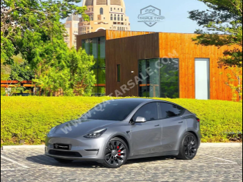 Tesla  Model Y  2023  Automatic  45,900 Km  0 Cylinder  All Wheel Drive (AWD)  SUV  Gray  With Warranty