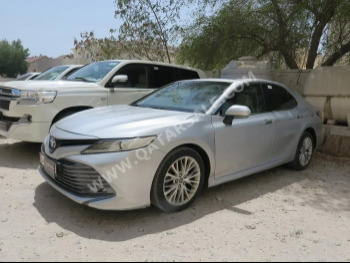 Toyota  Camry  Limited  2019  Automatic  122,000 Km  6 Cylinder  Front Wheel Drive (FWD)  Sedan  Silver