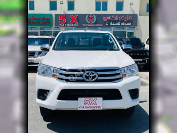 Toyota  Hilux  2020  Automatic  104,000 Km  4 Cylinder  Four Wheel Drive (4WD)  Pick Up  White