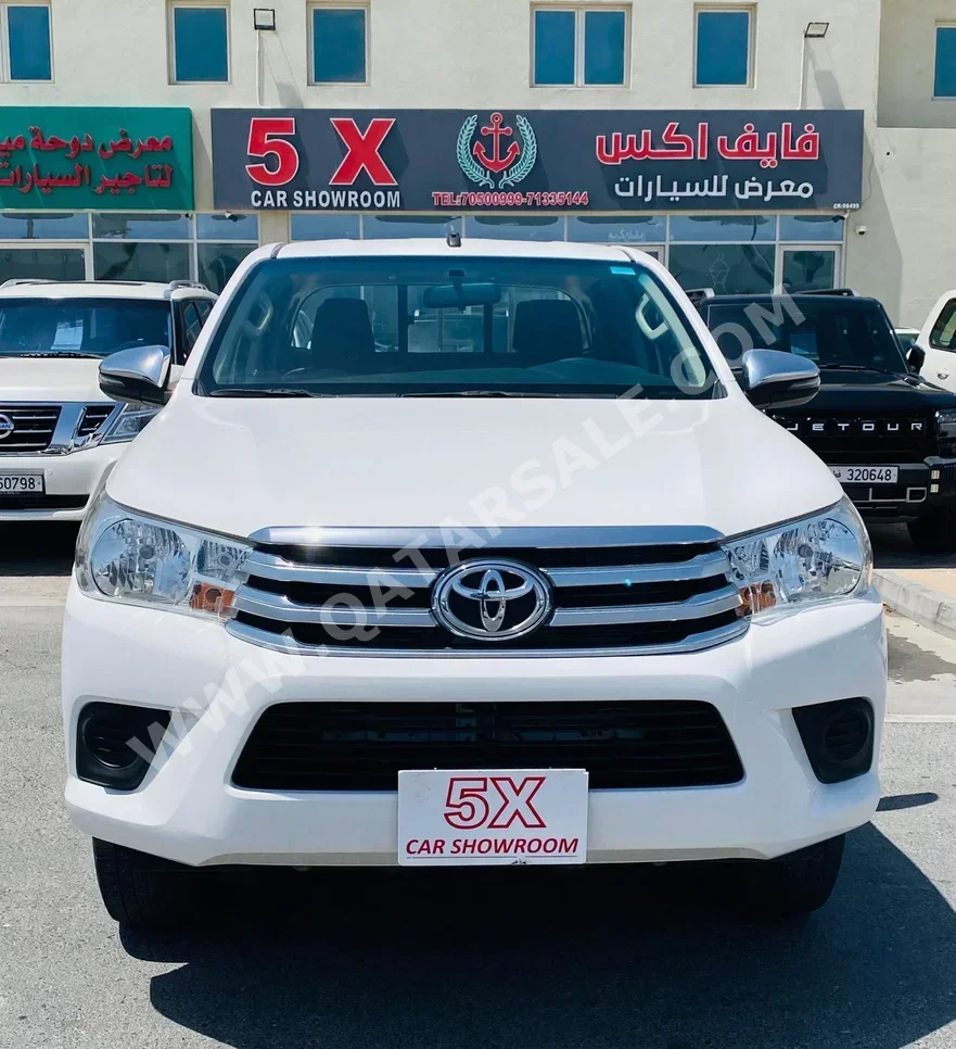 Toyota  Hilux  2020  Automatic  104,000 Km  4 Cylinder  Four Wheel Drive (4WD)  Pick Up  White