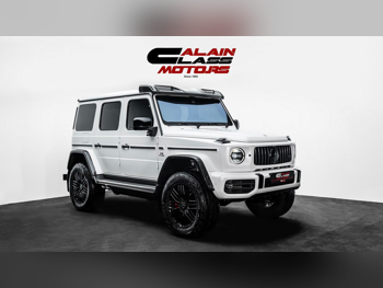 مرسيدس - بنز  جي - كلاس  63 اي ام جي 4x4²  2023  اوتوماتيك  6,000 كم  8 سلندر  دفع رباعي  اس يو في  أبيض