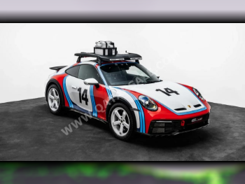 Porsche  911  Dakar  2023  Automatic  760 Km  6 Cylinder  Rear Wheel Drive (RWD)  Coupe / Sport  White and Red