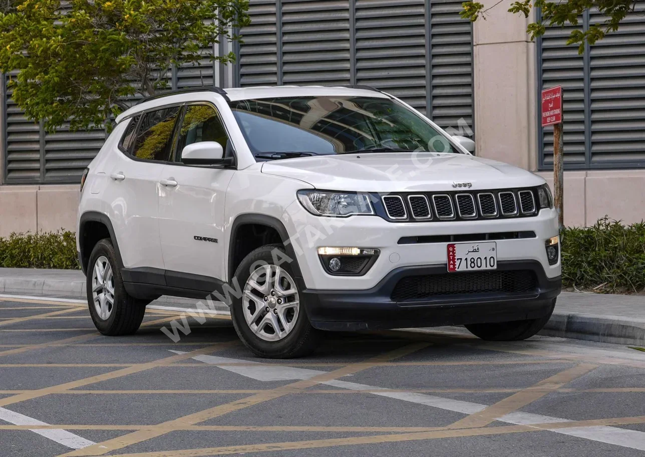 Jeep  Compass  2020  Automatic  77,000 Km  4 Cylinder  Four Wheel Drive (4WD)  SUV  White