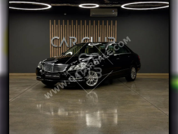 Mercedes-Benz  E-Class  200  2011  Automatic  70,000 Km  4 Cylinder  Rear Wheel Drive (RWD)  Sedan  Black