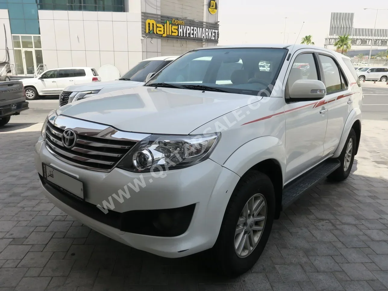 Toyota  Fortuner  2015  Automatic  110,000 Km  4 Cylinder  Four Wheel Drive (4WD)  SUV  White
