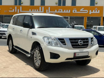 Nissan  Patrol  XE  2019  Automatic  100,000 Km  8 Cylinder  Four Wheel Drive (4WD)  SUV  White