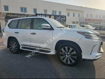 Lexus  LX  570  2009  Automatic  243,000 Km  8 Cylinder  Four Wheel Drive (4WD)  SUV  White