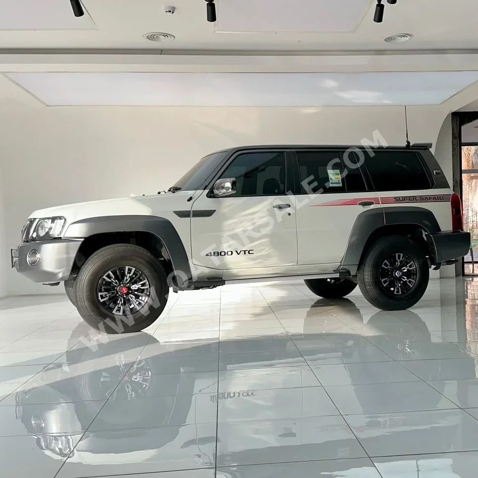 Nissan  Patrol  Super Safari  2023  Manual  33,000 Km  6 Cylinder  Four Wheel Drive (4WD)  SUV  Beige  With Warranty