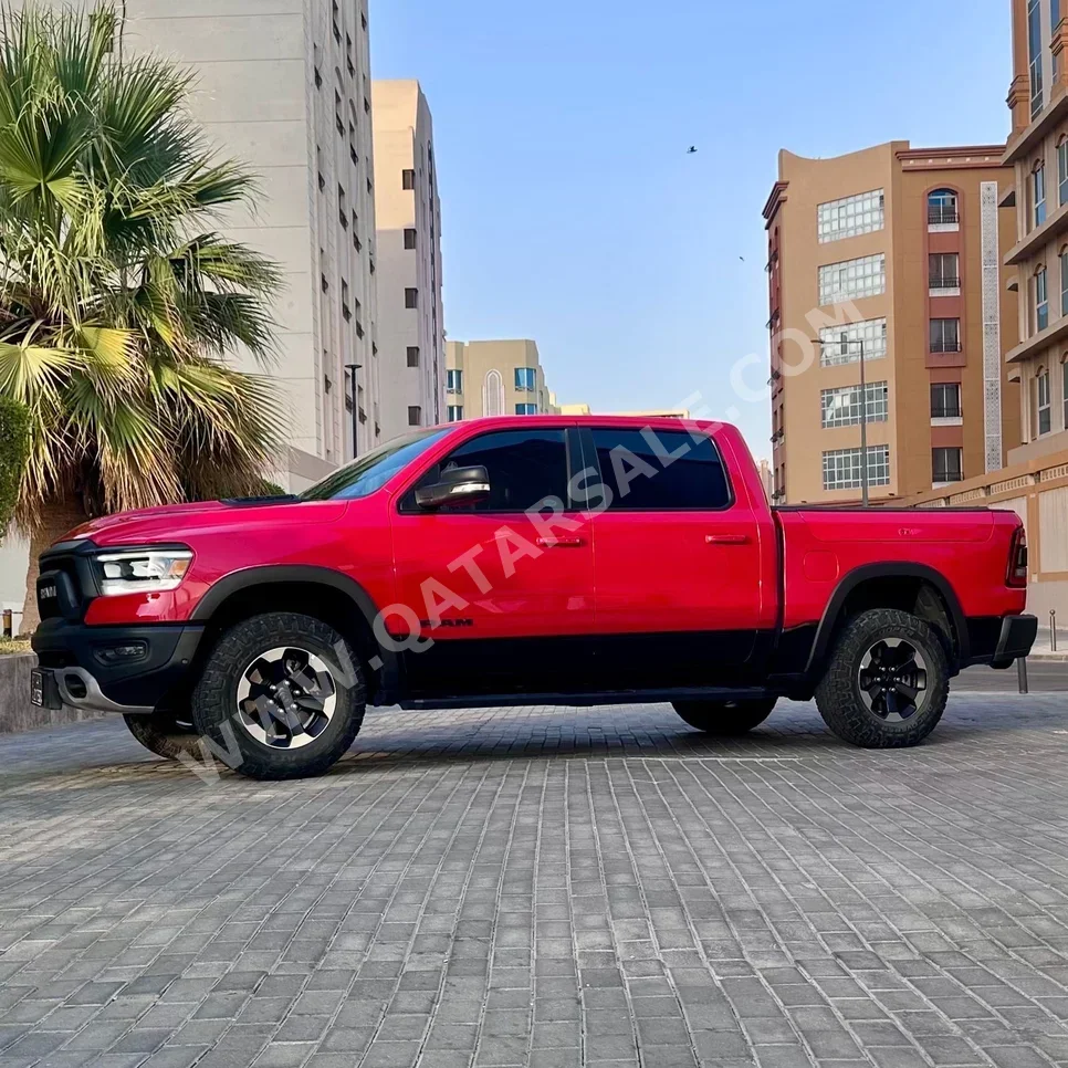 Dodge  Ram  Rebel  2019  Automatic  120,000 Km  8 Cylinder  Four Wheel Drive (4WD)  Pick Up  Red  With Warranty