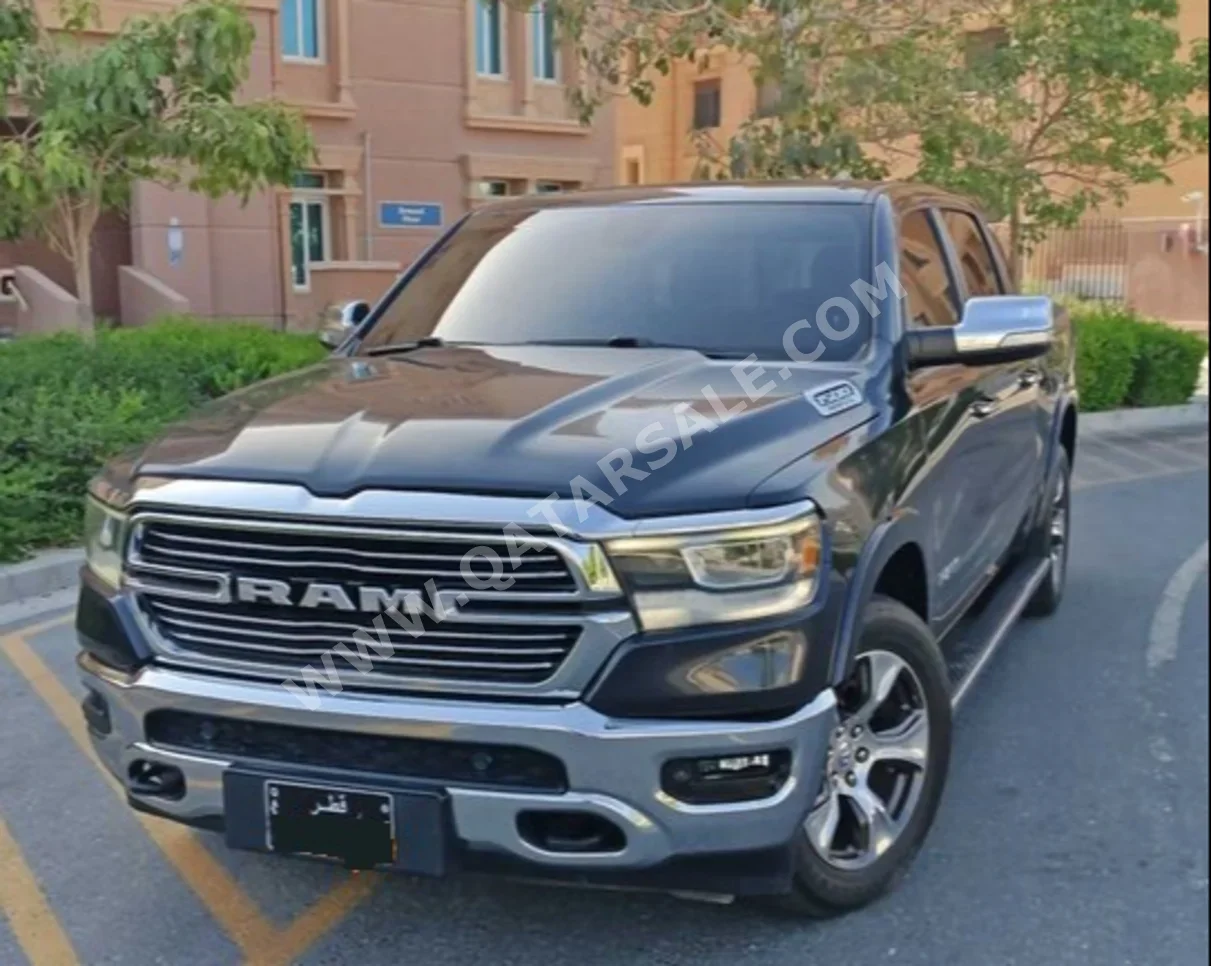 Dodge  Ram  1500 Laramie  2019  Automatic  134,000 Km  8 Cylinder  Four Wheel Drive (4WD)  Pick Up  Dark Gray