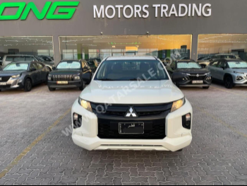 Mitsubishi  L 200  2020  Manual  160,000 Km  4 Cylinder  Rear Wheel Drive (RWD)  Pick Up  White
