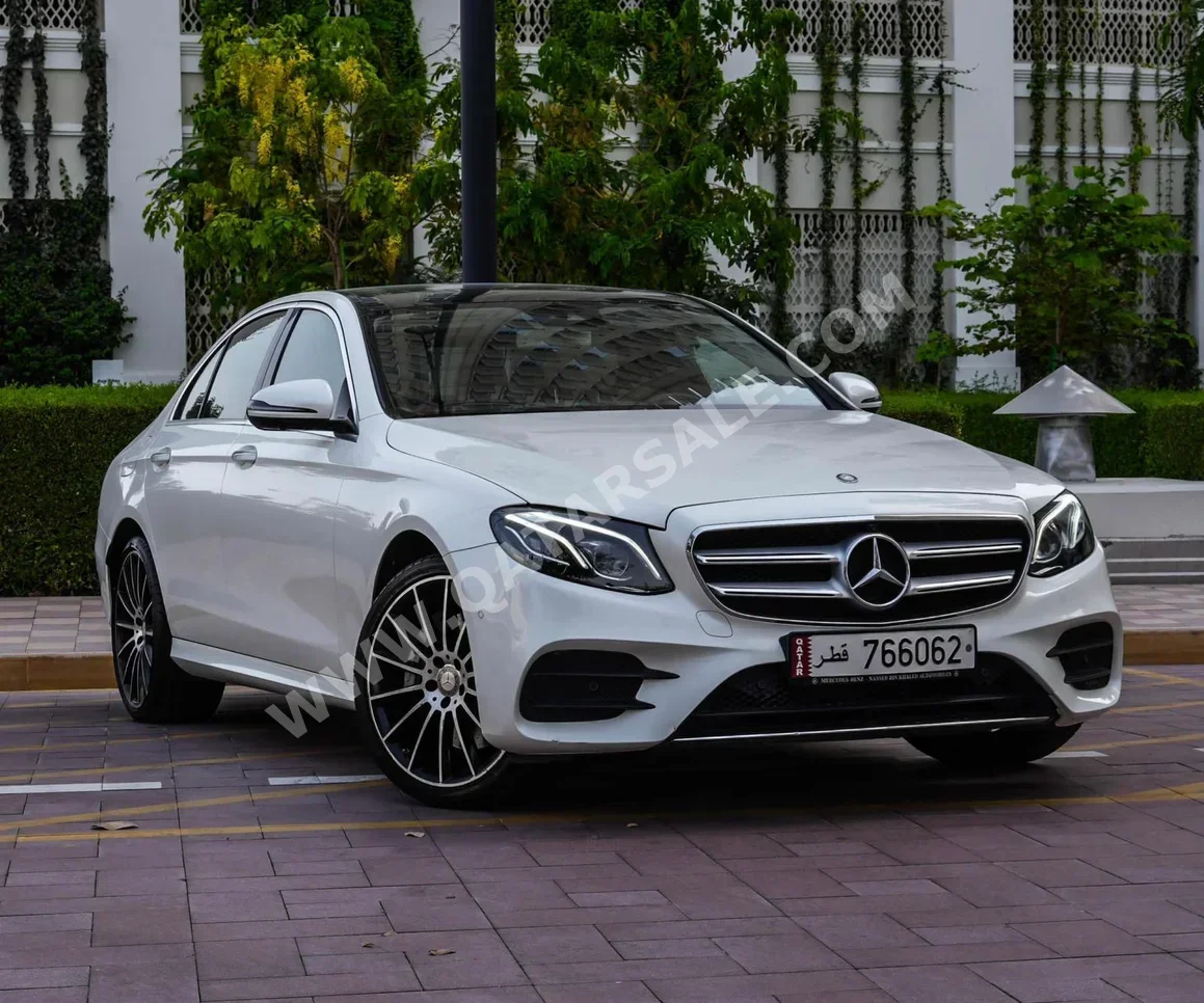 Mercedes-Benz  E-Class  400  2017  Automatic  30,000 Km  6 Cylinder  Rear Wheel Drive (RWD)  Sedan  White