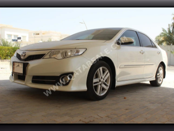 Toyota  Camry  2013  Automatic  253,000 Km  4 Cylinder  Front Wheel Drive (FWD)  Sedan  White