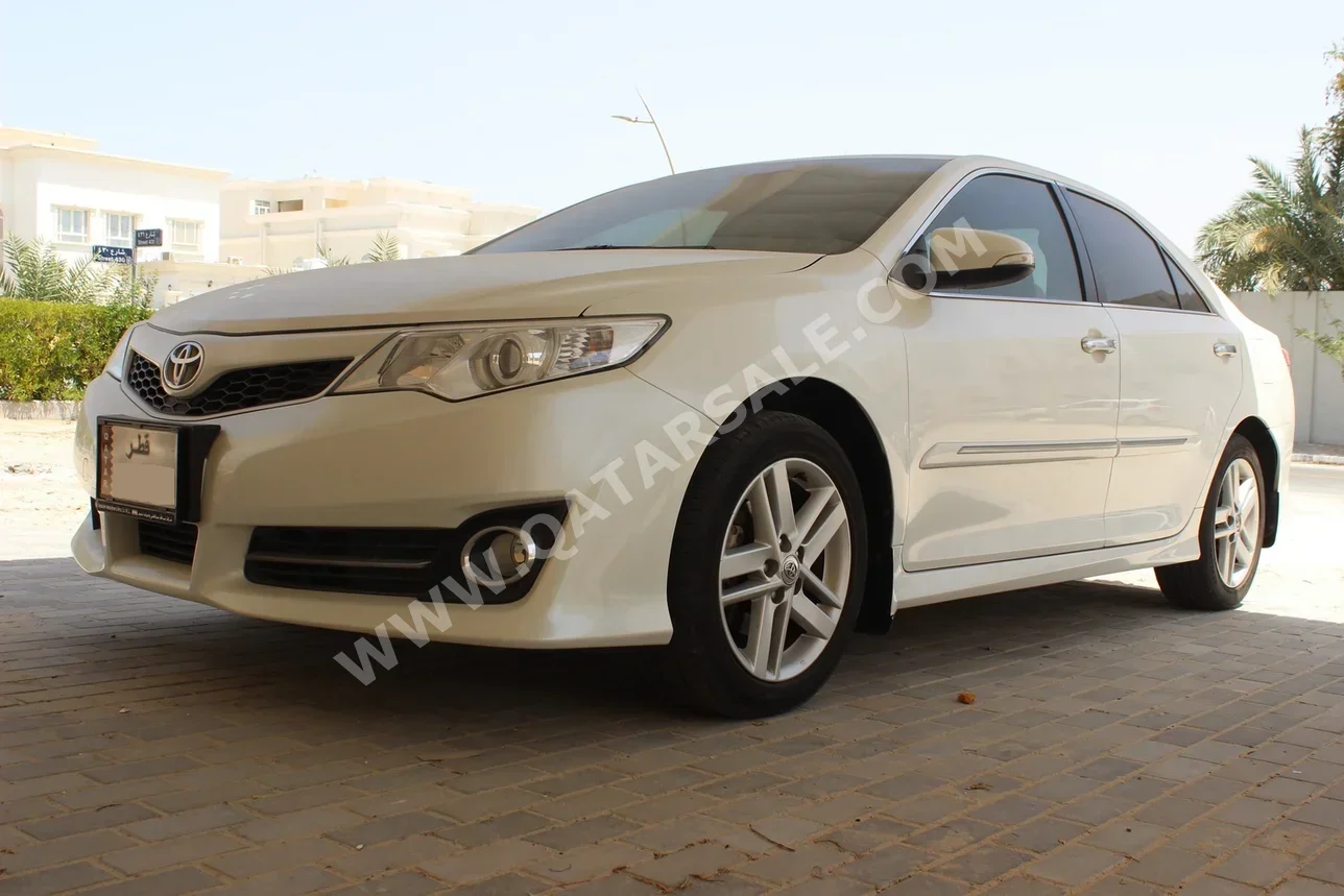 تويوتا  كامري  2013  اوتوماتيك  253,000 كم  4 سلندر  سحب امامي  سيدان  أبيض
