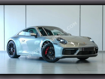 Porsche  911  Carrera GTS  2023  Automatic  10,356 Km  6 Cylinder  Rear Wheel Drive (RWD)  Coupe / Sport  Silver  With Warranty