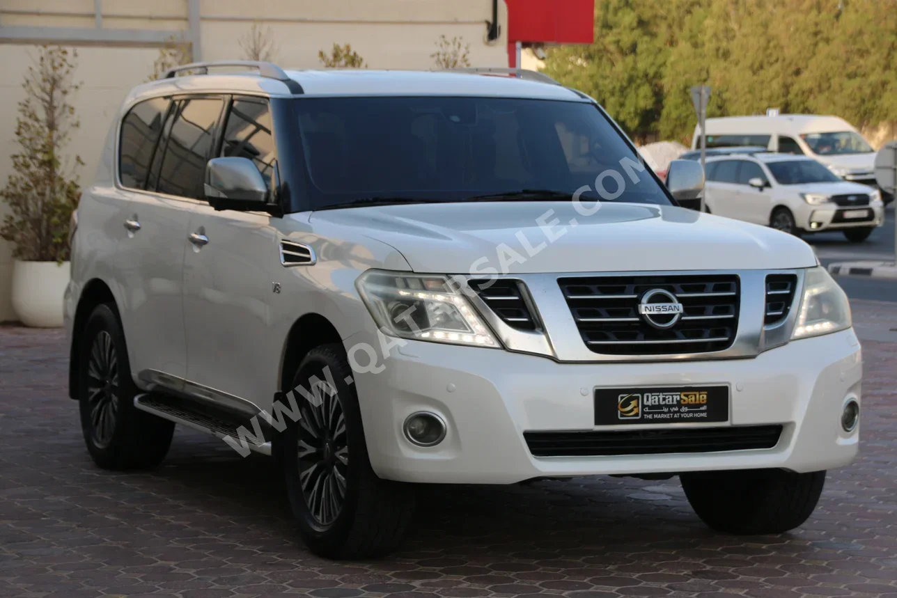 Nissan  Patrol  Platinum  2014  Automatic  270,000 Km  8 Cylinder  Four Wheel Drive (4WD)  SUV  White