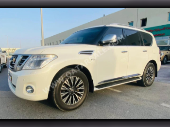 Nissan  Patrol  Platinum  2014  Automatic  285,000 Km  8 Cylinder  Four Wheel Drive (4WD)  SUV  White