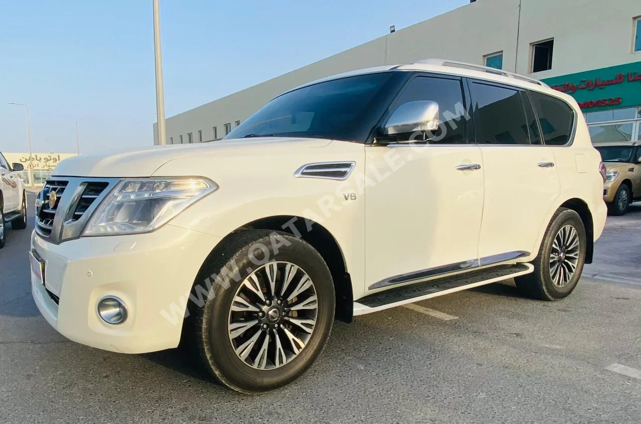 Nissan  Patrol  Platinum  2014  Automatic  285,000 Km  8 Cylinder  Four Wheel Drive (4WD)  SUV  White